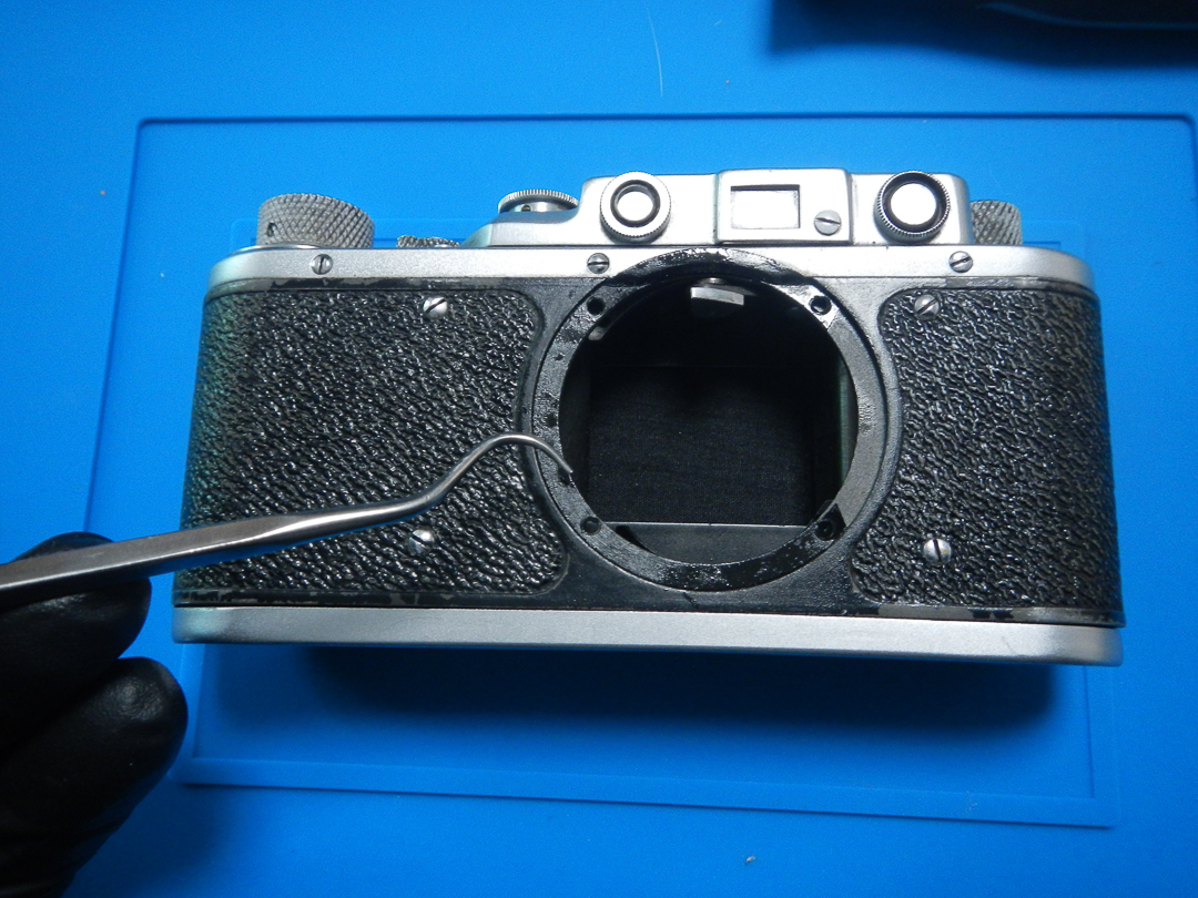Lens mount ring off, mount seat and shim area exposed