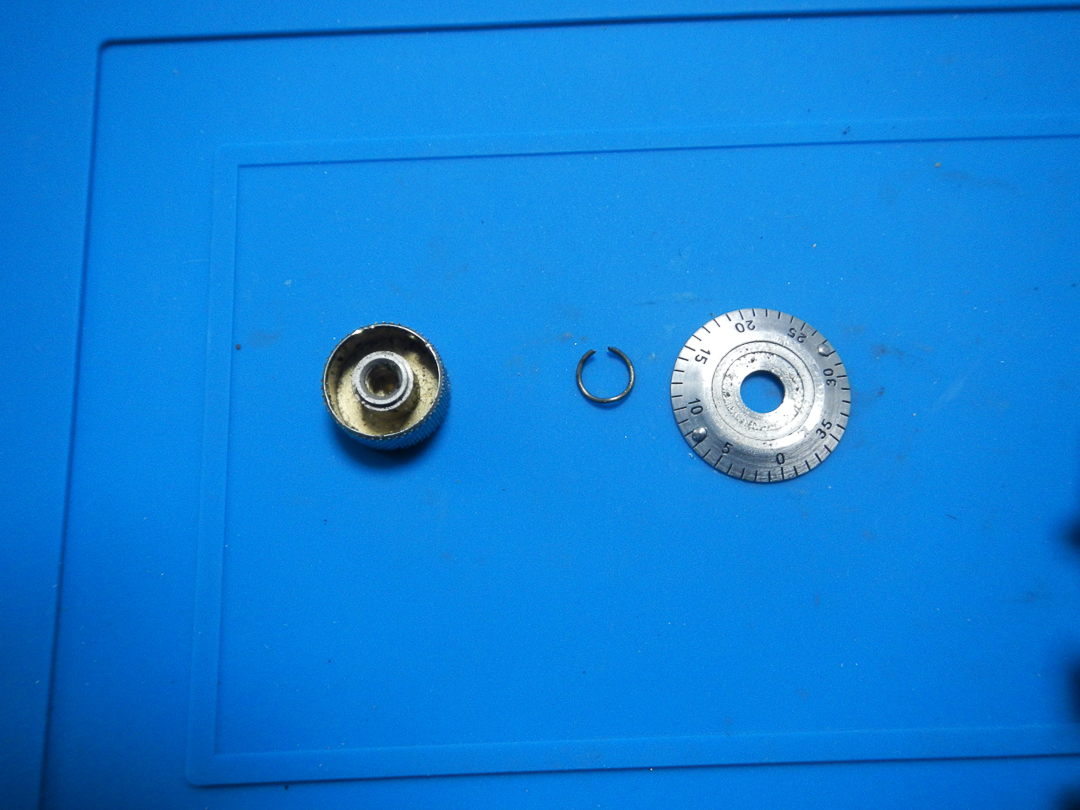 Wind knob, circlip and the frame counter disc